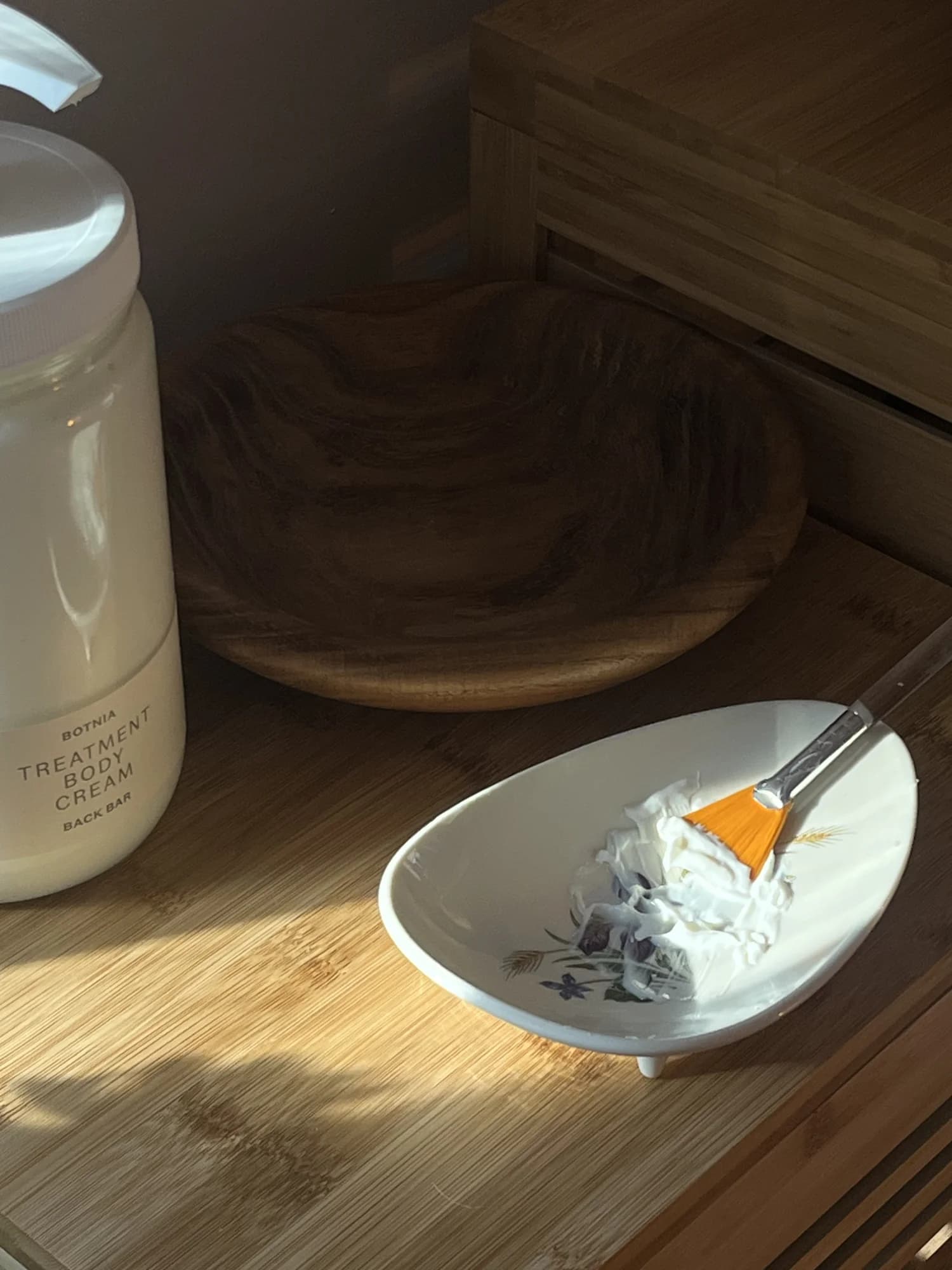 Botnia botanical mask — hand-mixed ingredients in warm light